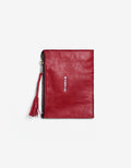 Crimson leather wallet front part.