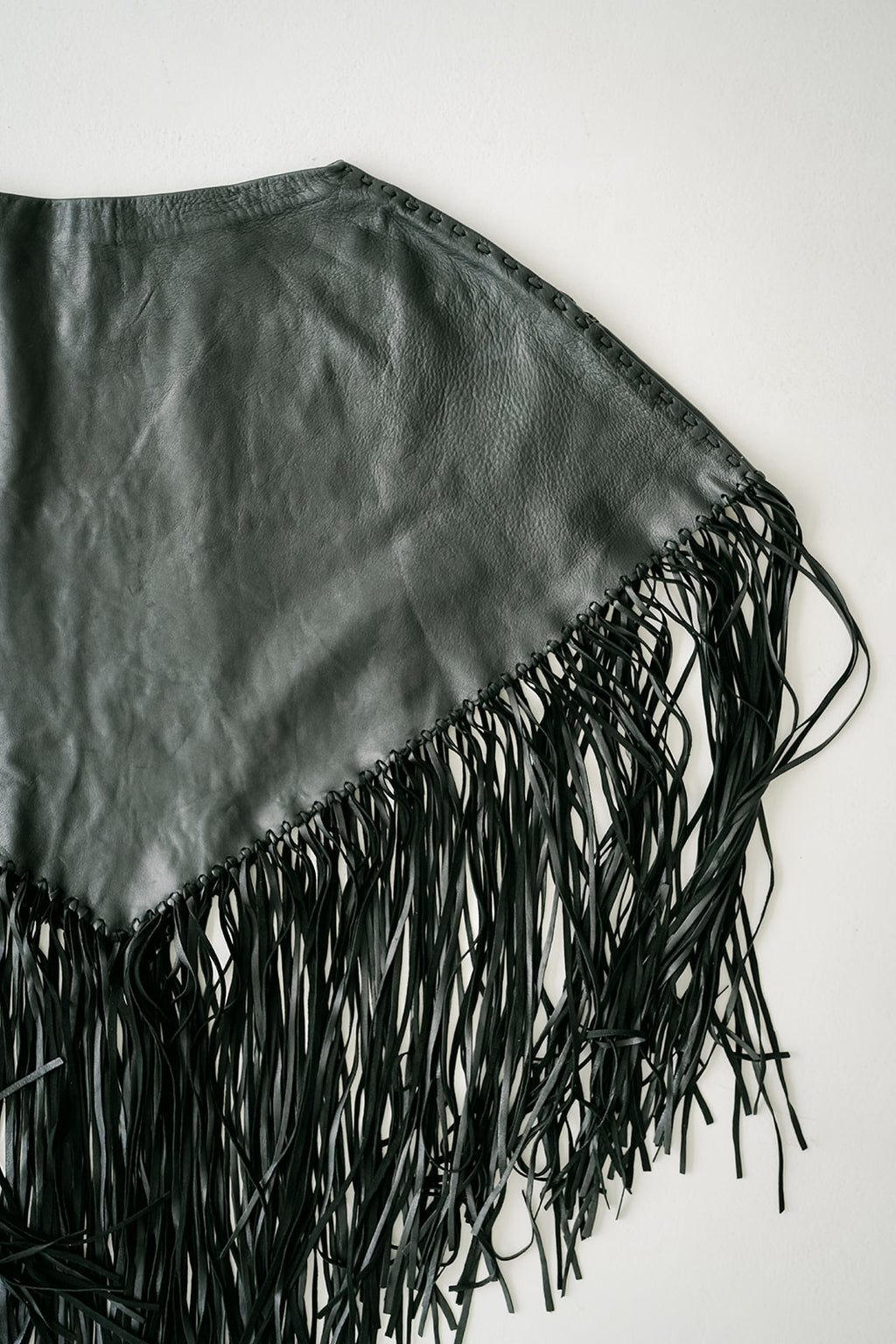 ROMPER Shoemaker poncho in black — full look