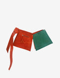 Zadie modular leather belt in burnt orange and teal green, front view — deadstock sheepskin panels