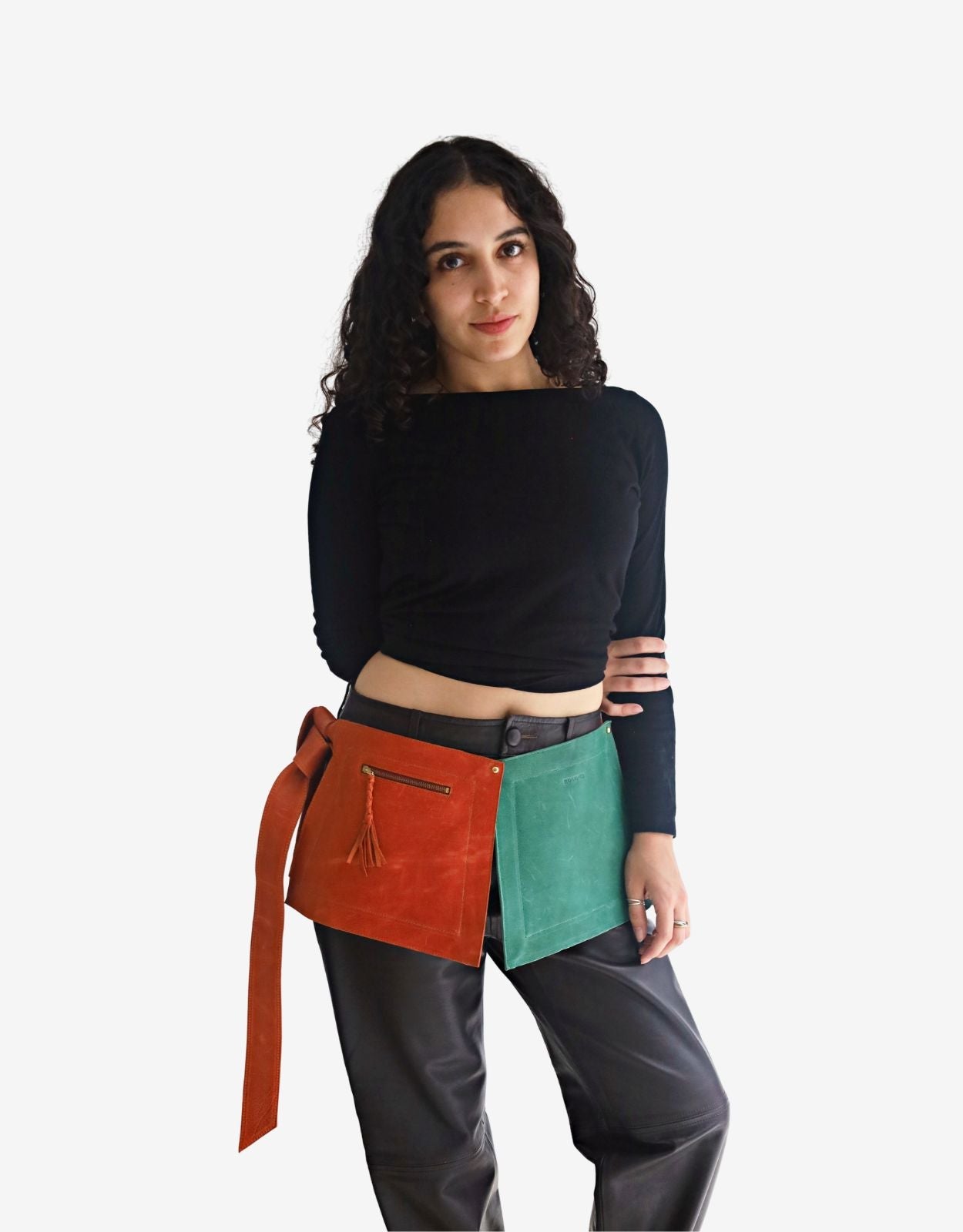 Zadie modular leather belt worn on body, front view — burnt orange and teal panels with gold-tone Italian hardware